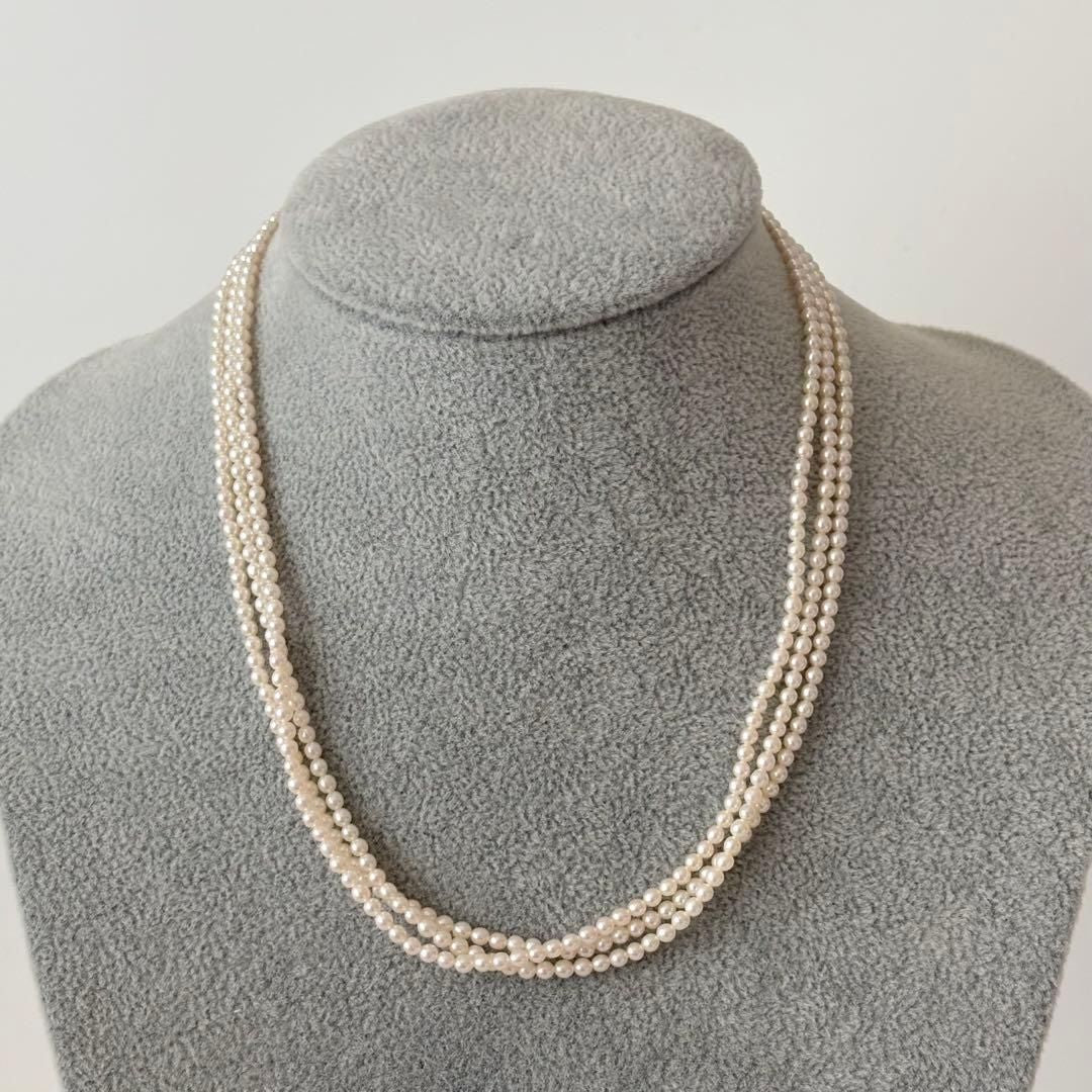 428 Tasaki silver necklace with three rows of approximately 2.7-2.9mm pearls and silver clasp