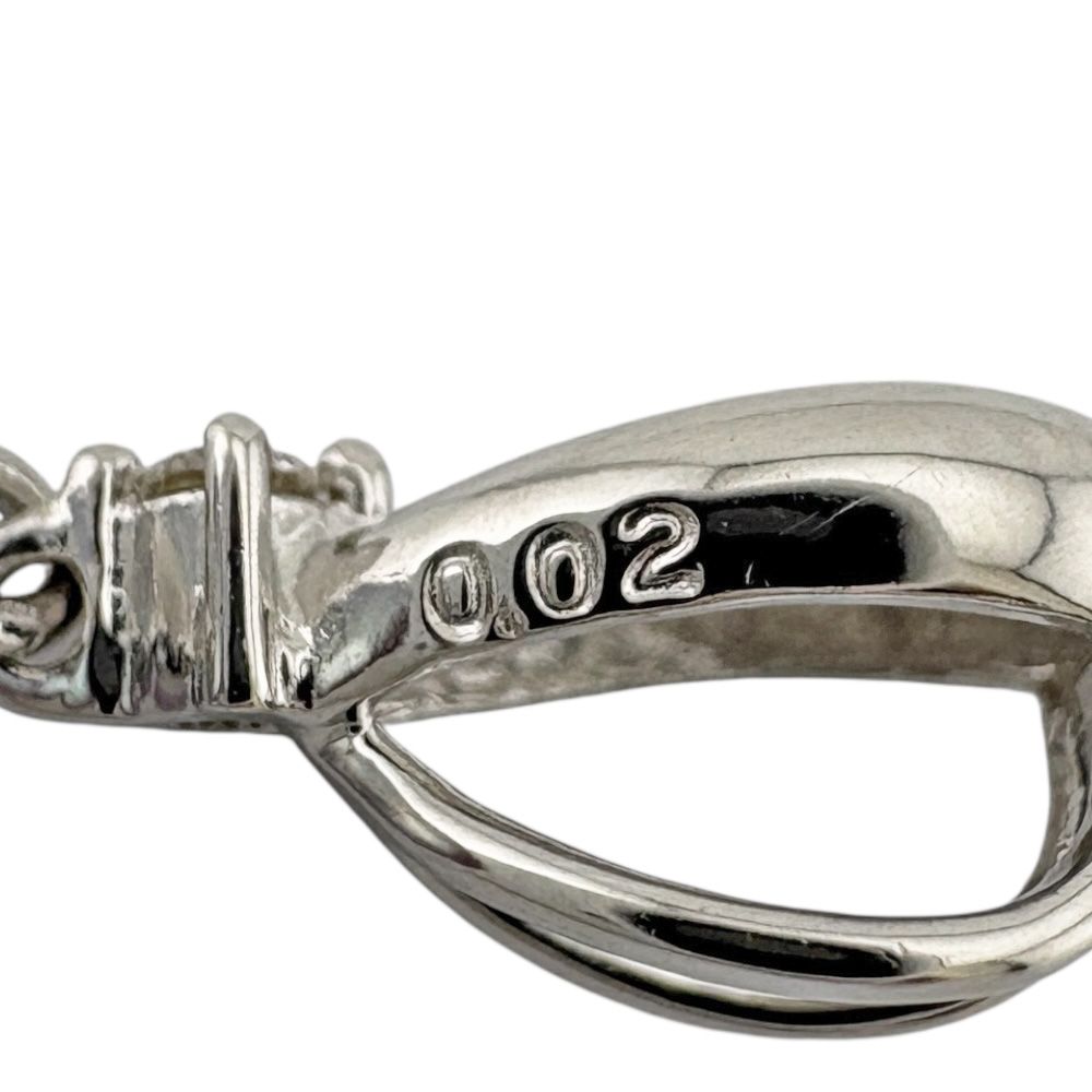 Tasaki 18K white gold pendant top with pearl and small diamond on silver chain