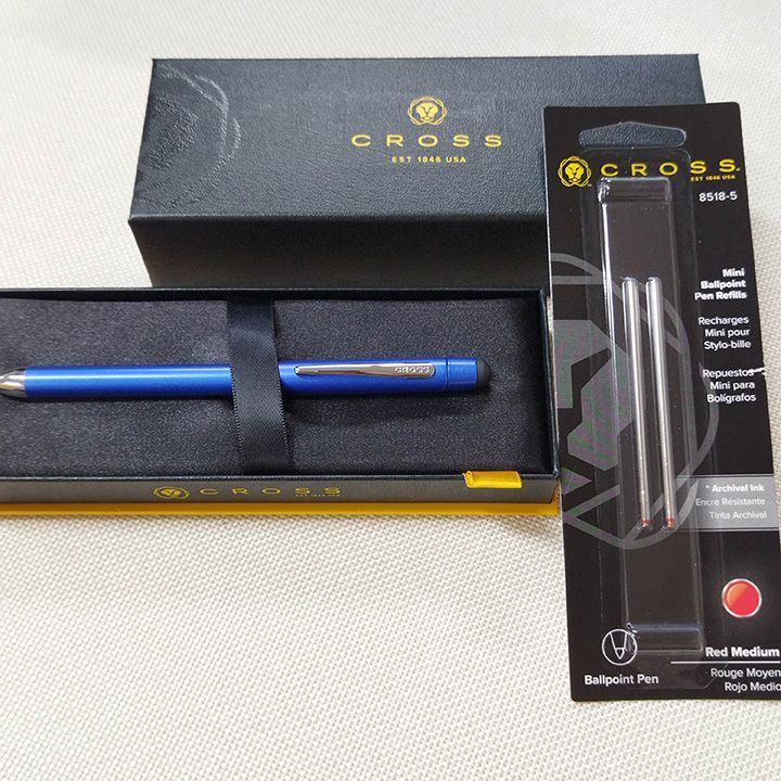 Cross multifunction pen with blue lacquer body, chrome clip, black and red ink, and mechanical pencil features