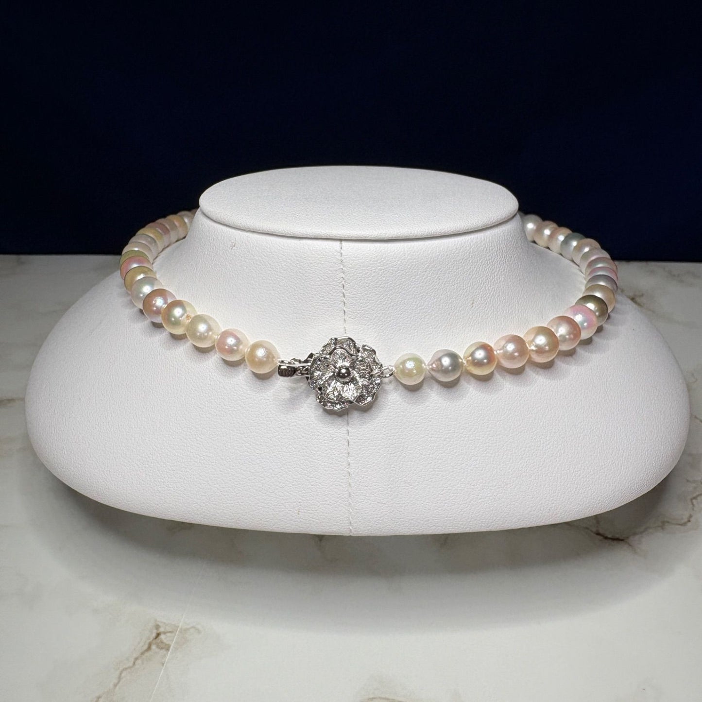 Akoya genuine pearl necklace with multi-gradient 6-10mm narrow drop pearls and silver fittings on a 43cm chain
