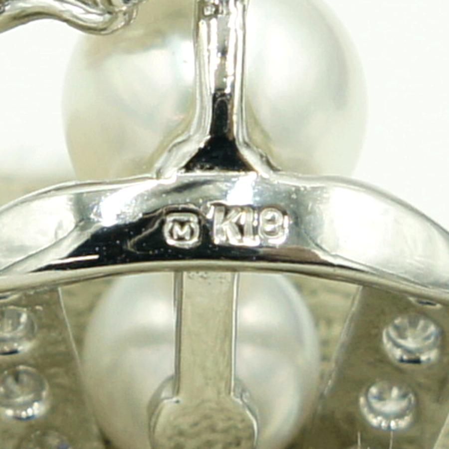 Mikimoto K18 gold pendant top with pearl and diamond detailing measuring 21.5mm by 13.7mm