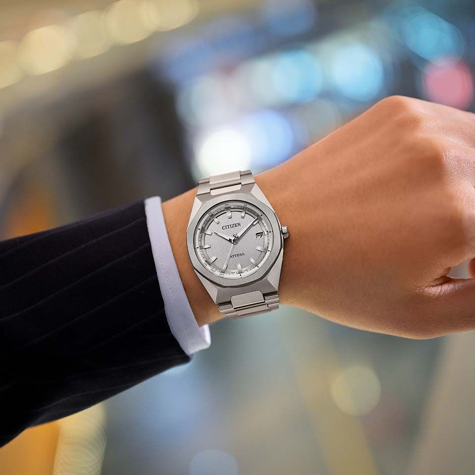 Citizen Attesa CB3040-56H men's watch with silver case and black dial shown on a wrist