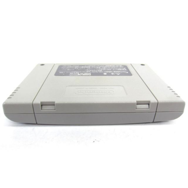 CLOCK TOWER Super Famicom game cartridge UR1042 with visible scuffs and discoloration