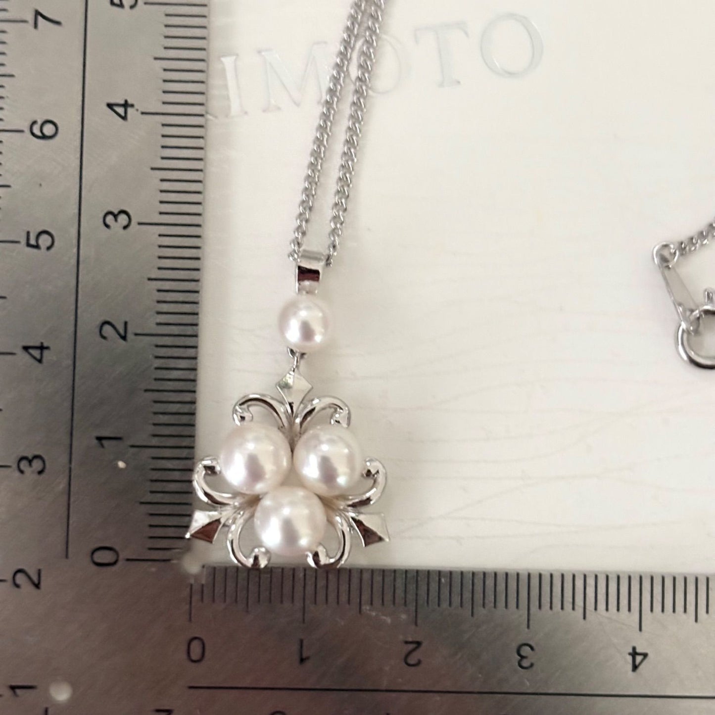370 Mikimoto silver necklace with round pearls and 42cm length on a white background