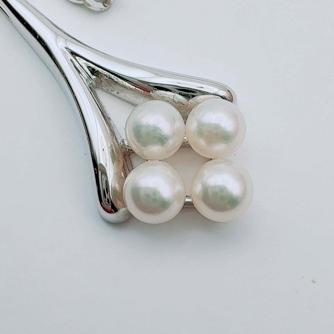 Mikimoto necklace with a 4.9mm baby pearl pendant and 40.5cm chain in silver tone