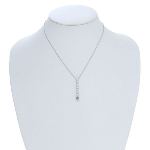 Mikimoto white gold diamond necklace with 7 round cut and 1 square cut diamonds, 40 cm length
