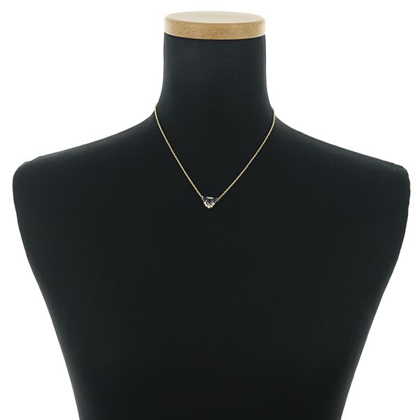 Mikimoto necklace with sapphire and diamond pendant set in 18K yellow gold, showing detailed gemstones and chain
