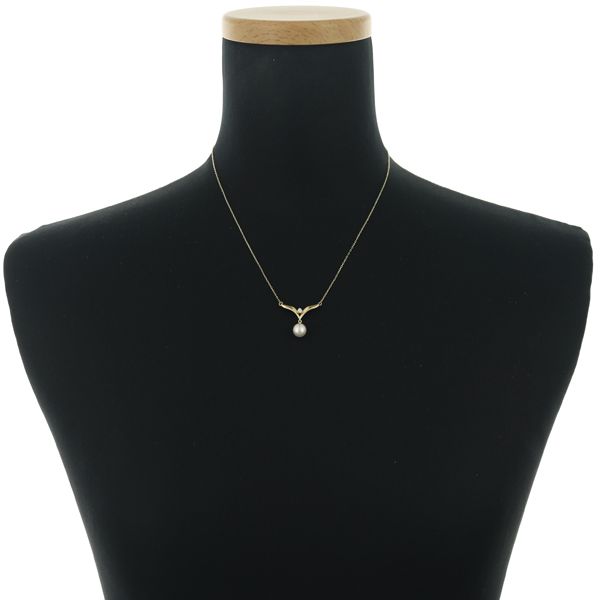 Mikimoto 7.0mm pearl necklace with diamond accents set in 18K yellow gold, 42cm length