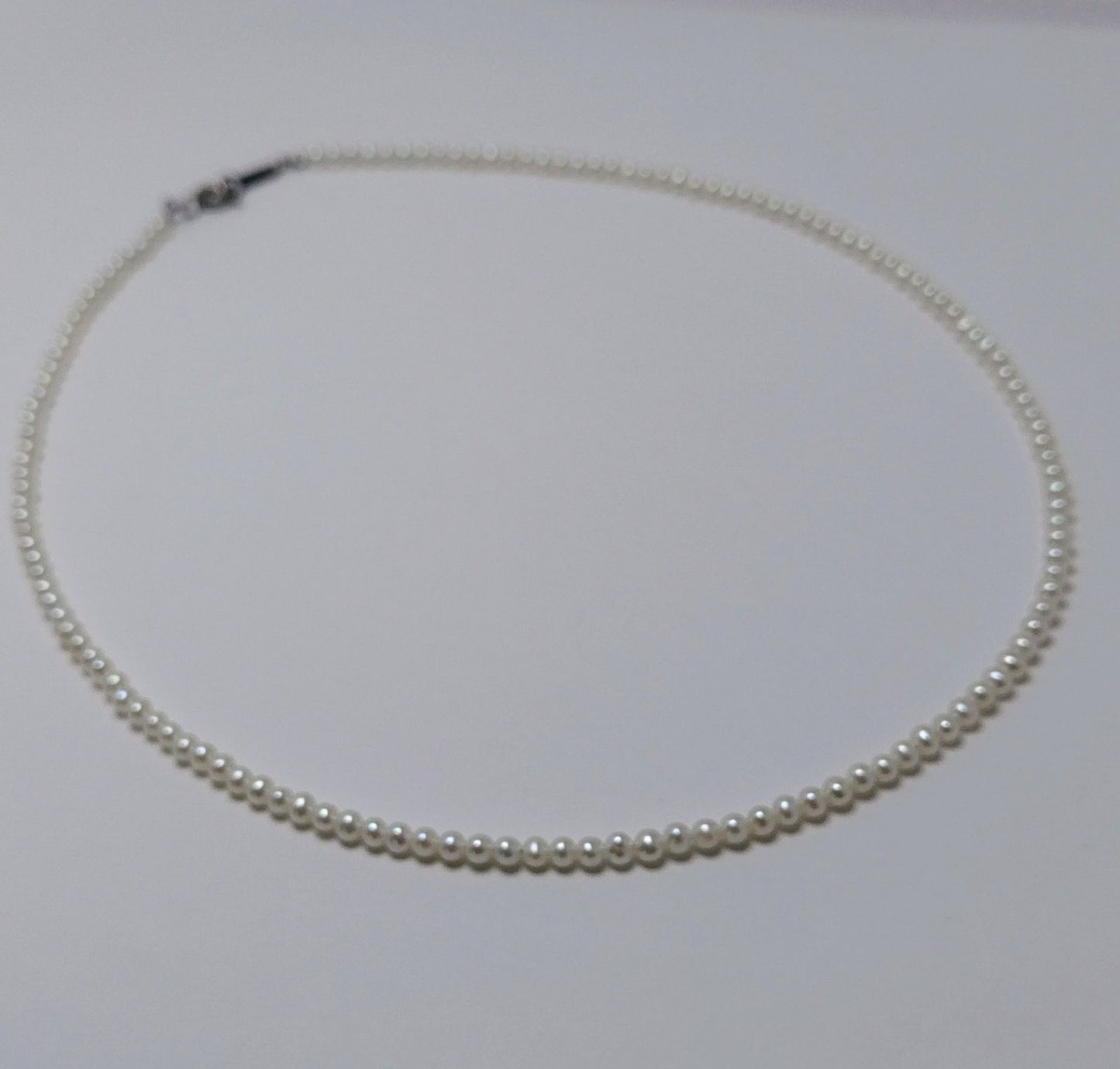 Baby 3mm white Akoya and freshwater pearl necklace with semi-round pearls and good luster