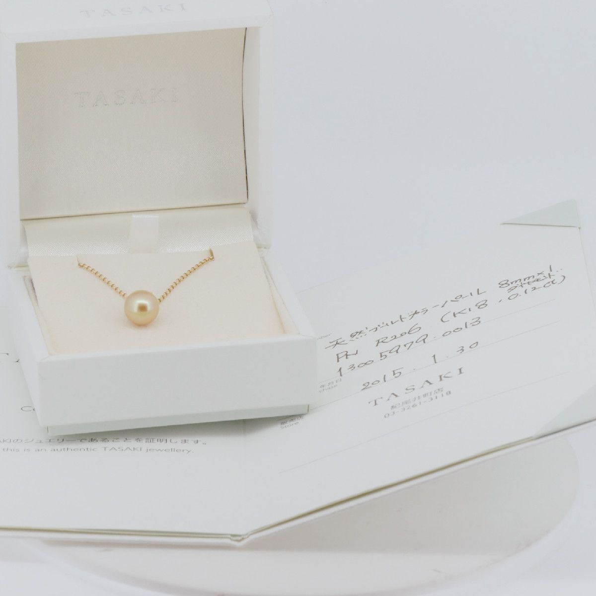 Tasaki Law gold necklace featuring an 8.8mm golden pearl and 0.12ct diamond on an 18K yellow gold chain