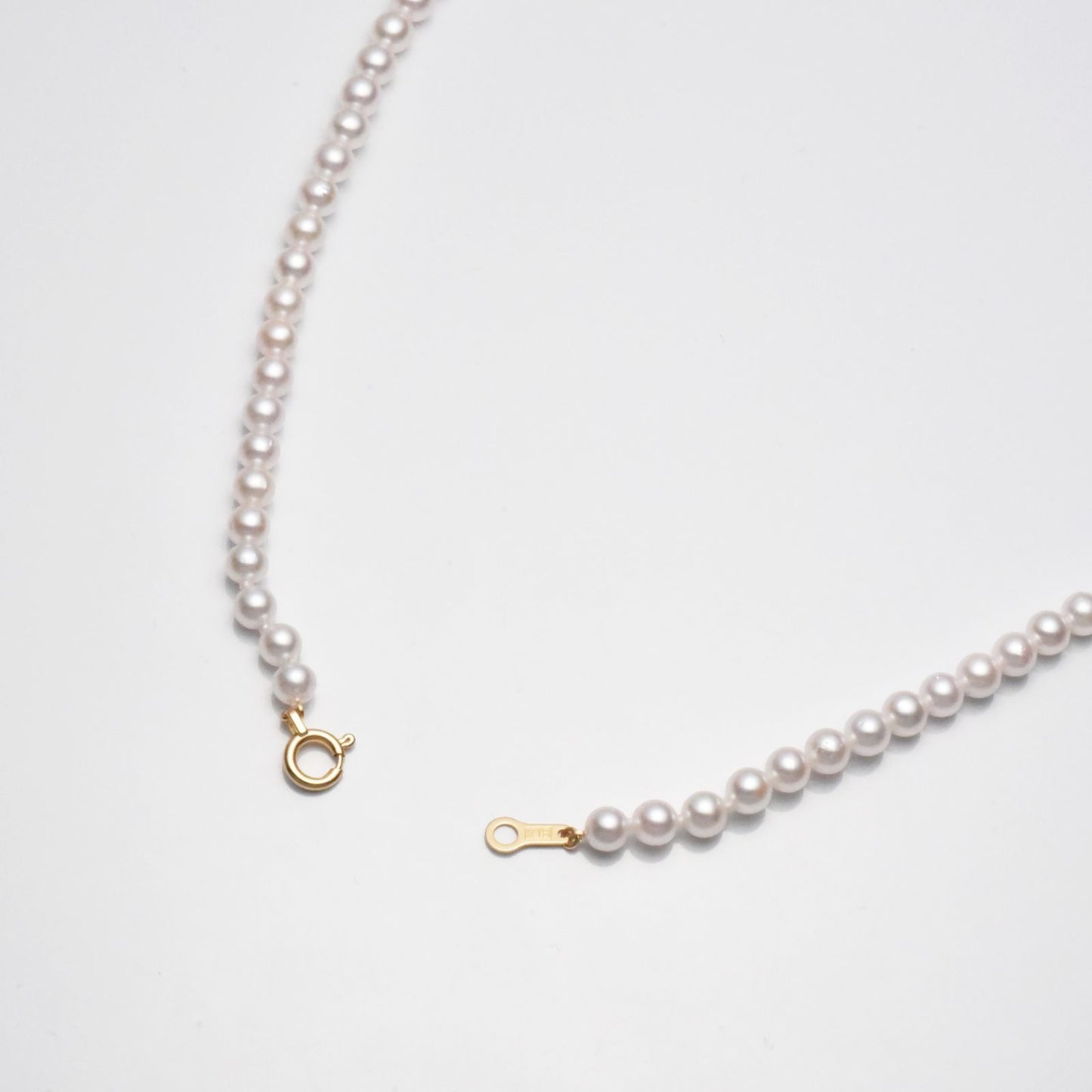 K18 yellow gold Akoya cultured pearl necklace 3.5-4mm with clasp plate on 40cm HDPE cord