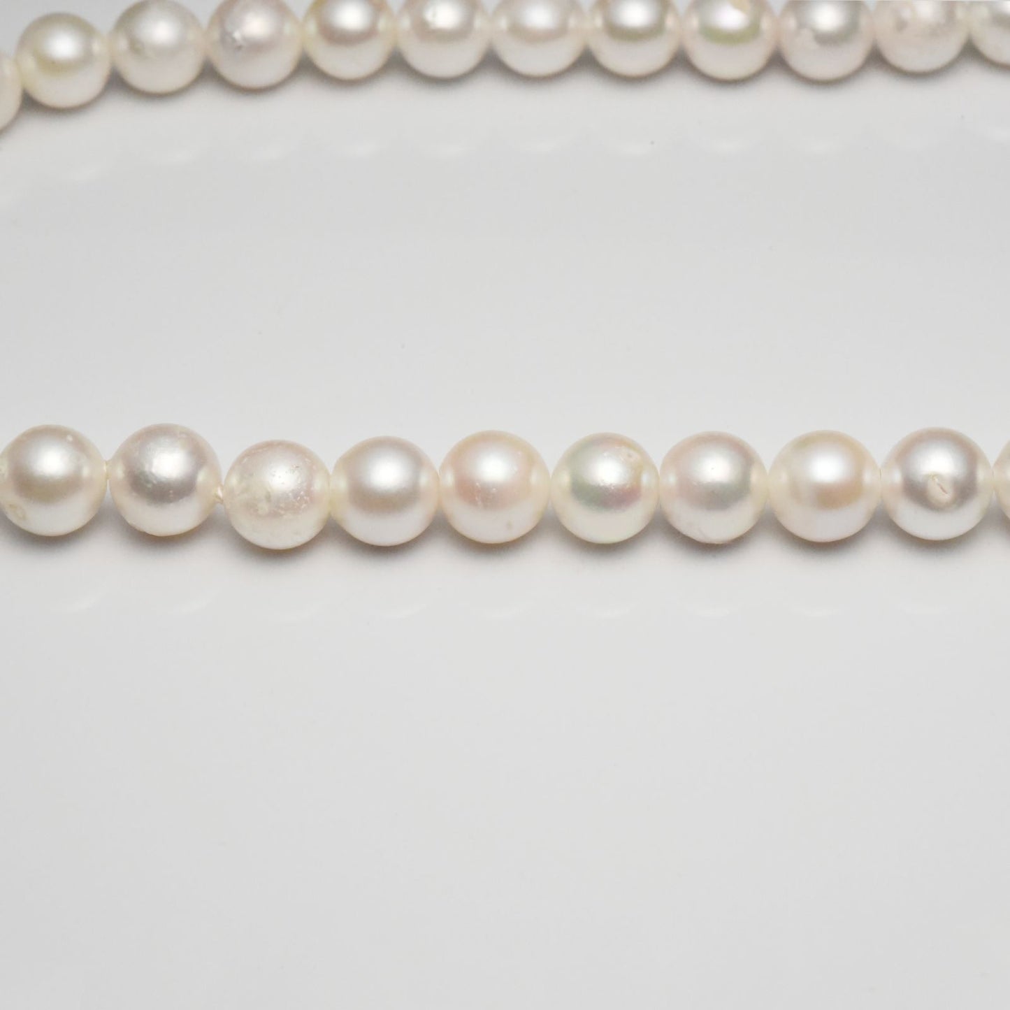 Akoya pearl necklace featuring 8-8.5mm round pearls on a 42cm string with silver clasp