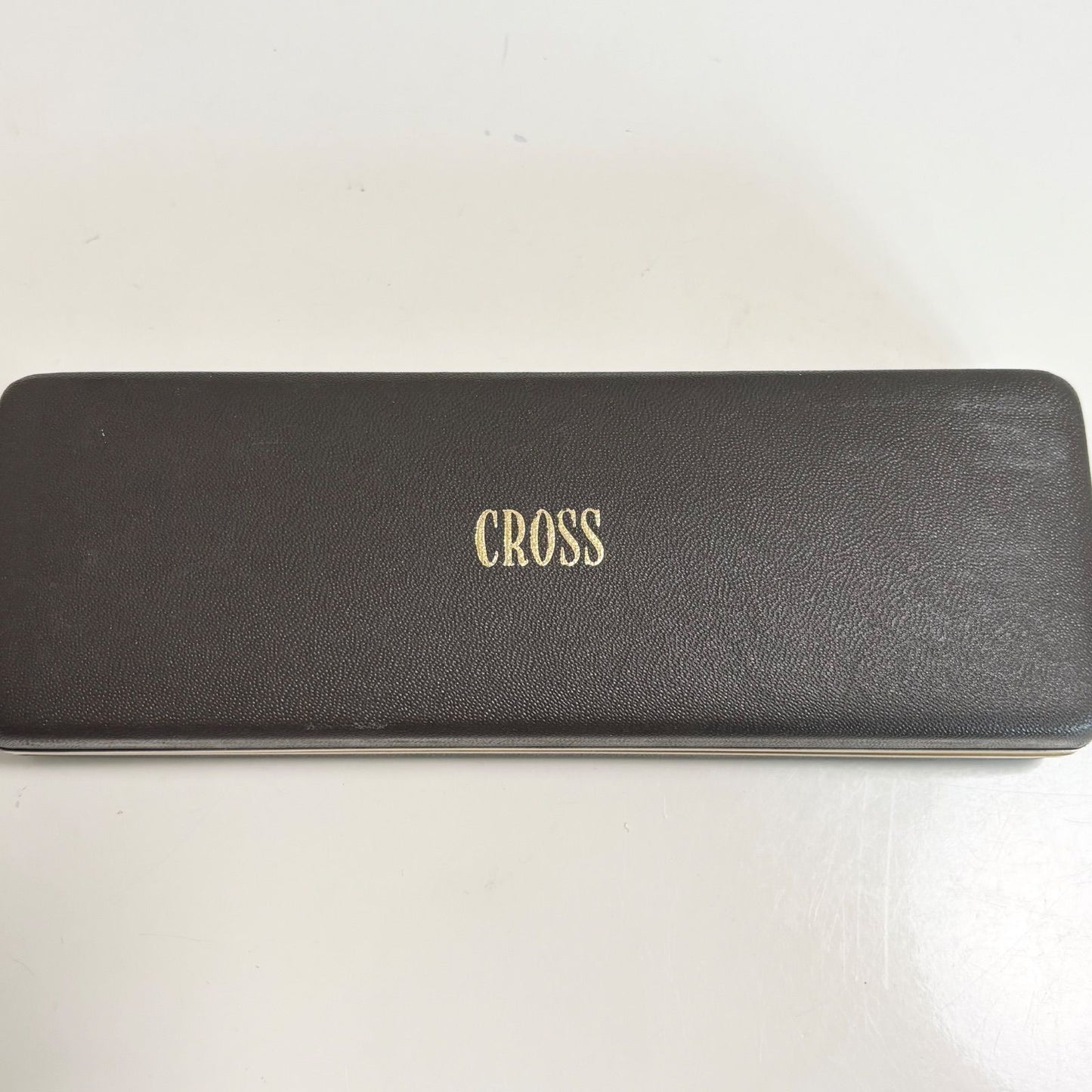 Silver Cross mechanical pencil with case and bag, showing minor scratches due to used condition