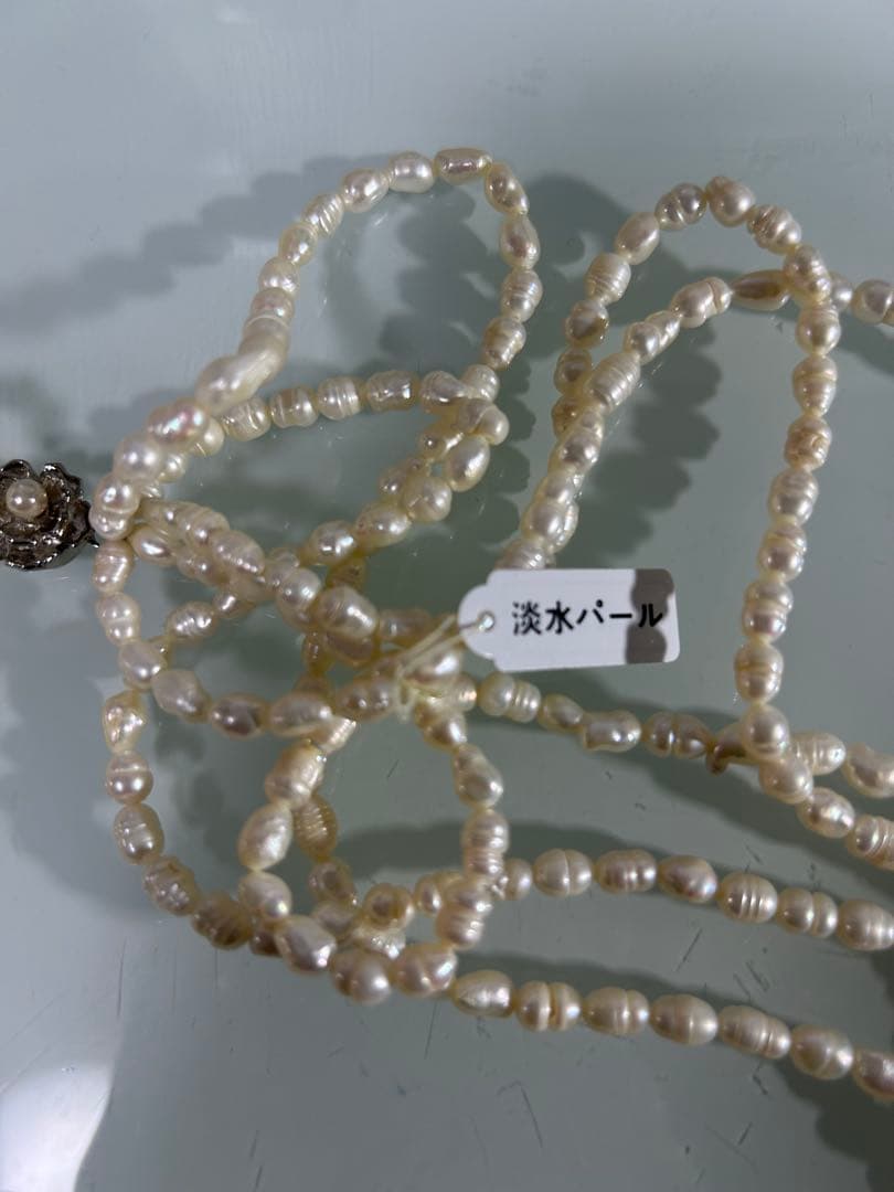Mikimoto 5-strand freshwater pearl necklace with 5 to 6 mm pearls, approximately 58 cm long, made in Japan