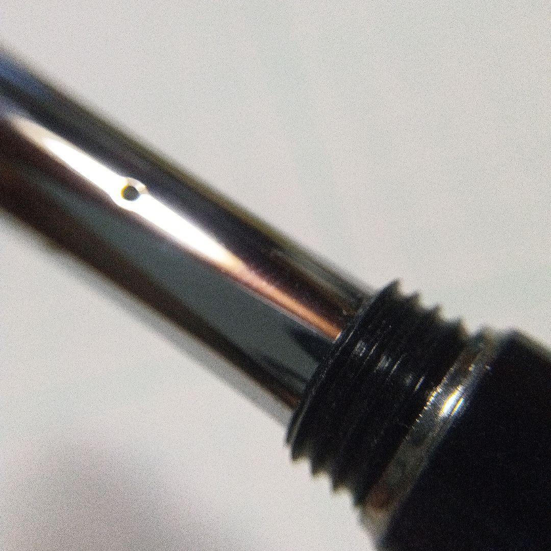 Black Pilot Desk Pen with 14K gold nib showing scratches and discoloration, accompanied by damaged storage box