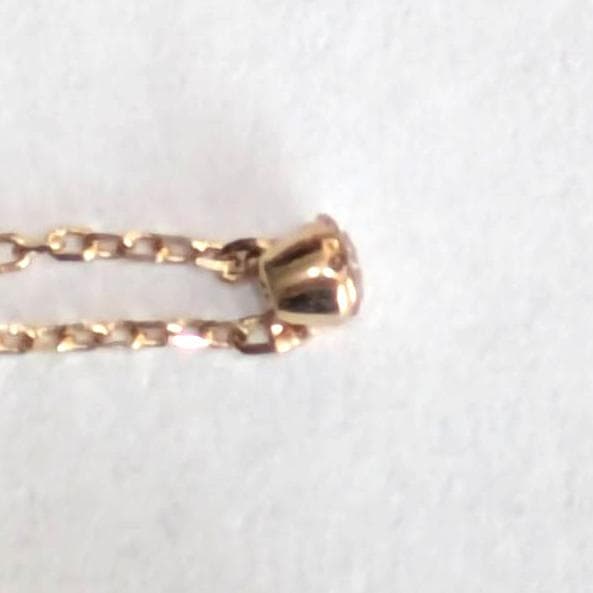 agete Law yellow gold necklace featuring one pearl and a small diamond, 40 cm length with 3 cm adjuster