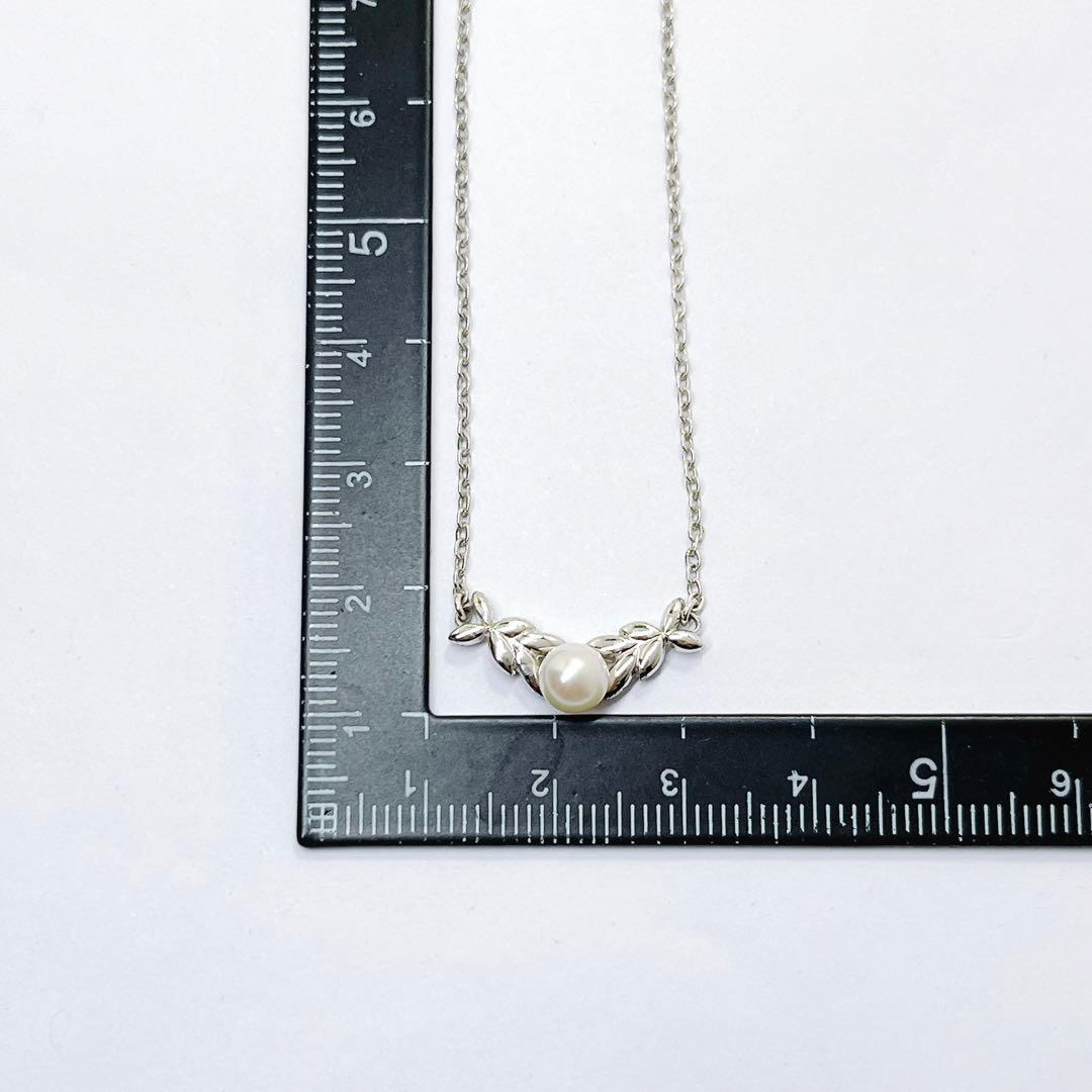 Mikimoto pearl necklace with 5.3mm pearls and silver leaf pendant on 40cm chain