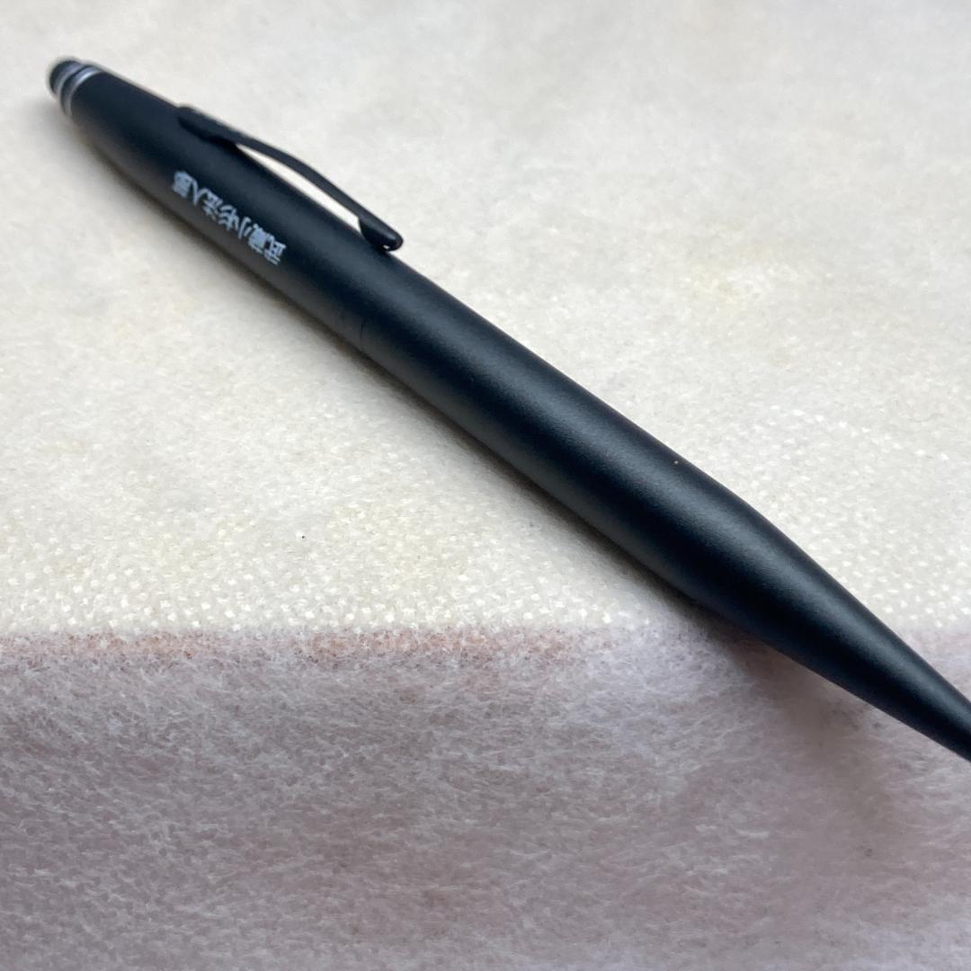 CROSS black ballpoint pen with twist mechanism and matching black case on white background