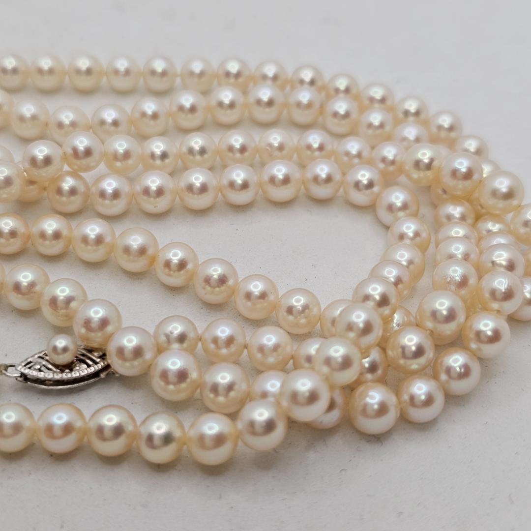 Akoya Pearl necklace 105cm long with 5mm white pink pearls and 10 karat white gold clasp