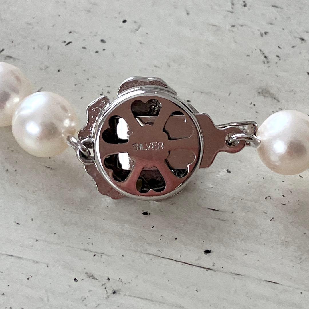 Akoya pearl necklace in silver with 6mm pearls and 44cm length displayed on white background