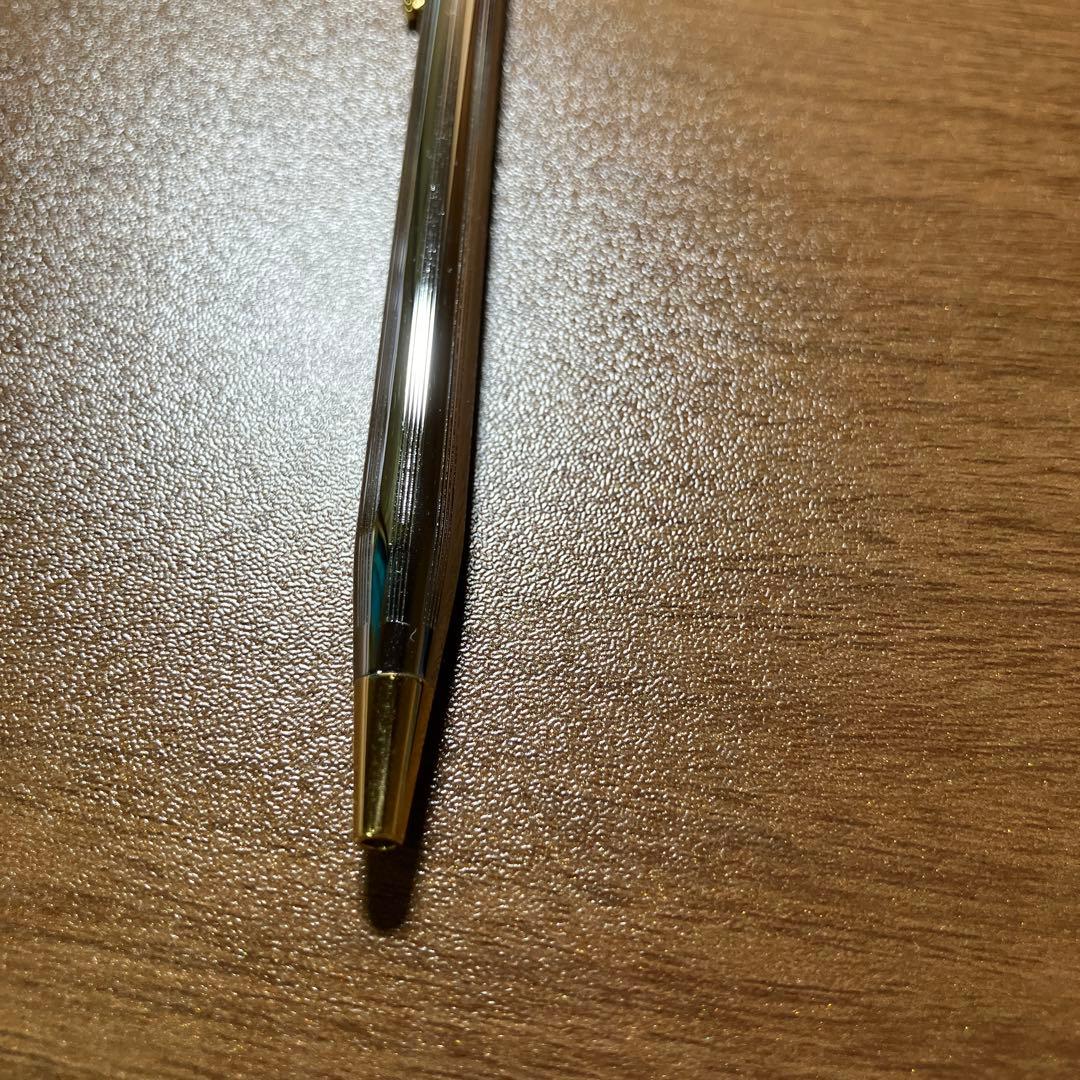 CROSS Twist Ballpoint Pen in gold and silver with a slim, refined silhouette and twist mechanism