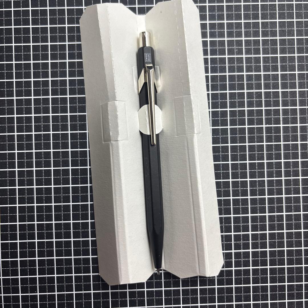 Pilot Ecrineno mechanical pencil in black and gold with box and sticker on white background
