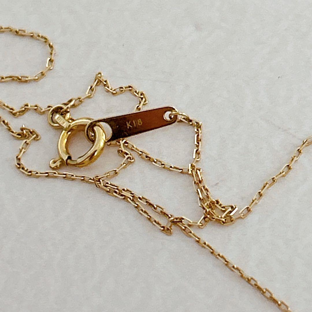 agete K18 gold necklace with 0.09 carat diamonds and 40 cm chain on white background