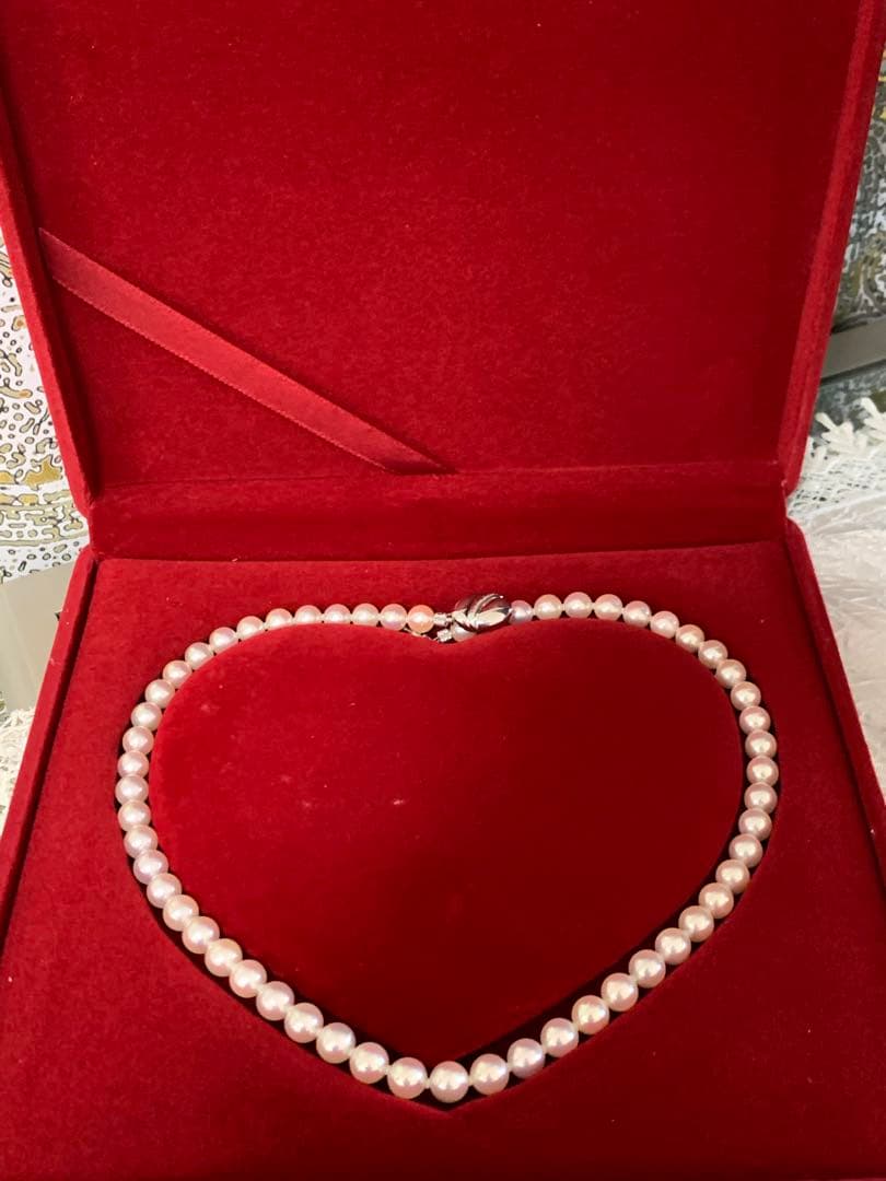 Akoya pearl necklace with 57 round 7mm pearls measuring 45cm length in pristine condition
