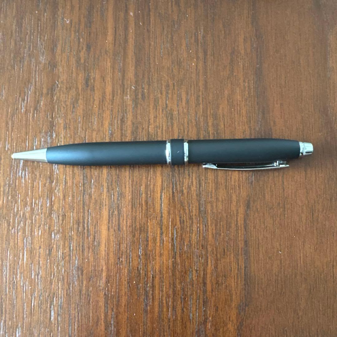 Cross black metal ballpoint pen with a matching protective case displayed on a white background