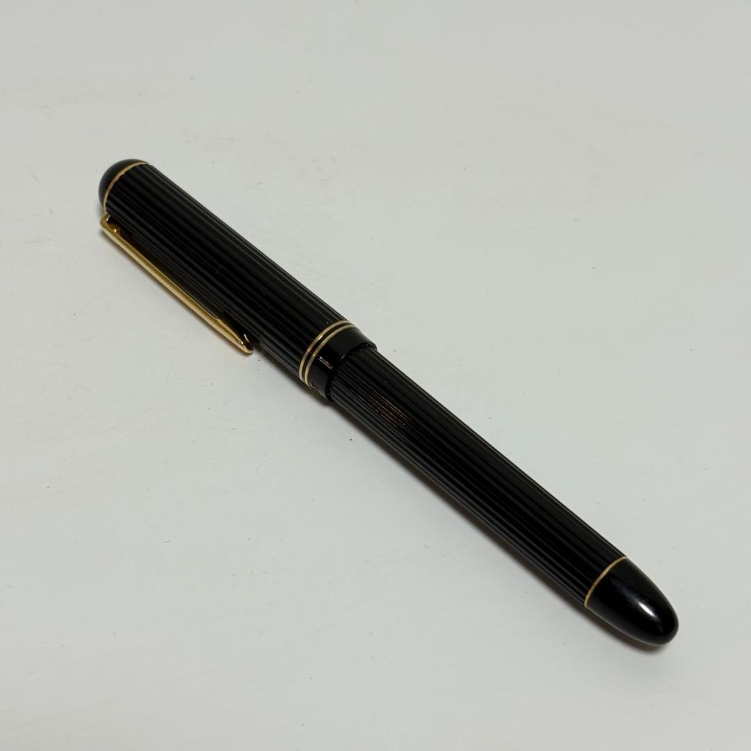 Used PILOT Justus 14K 585 fine point fountain pen with 14K gold nib and some signs of wear