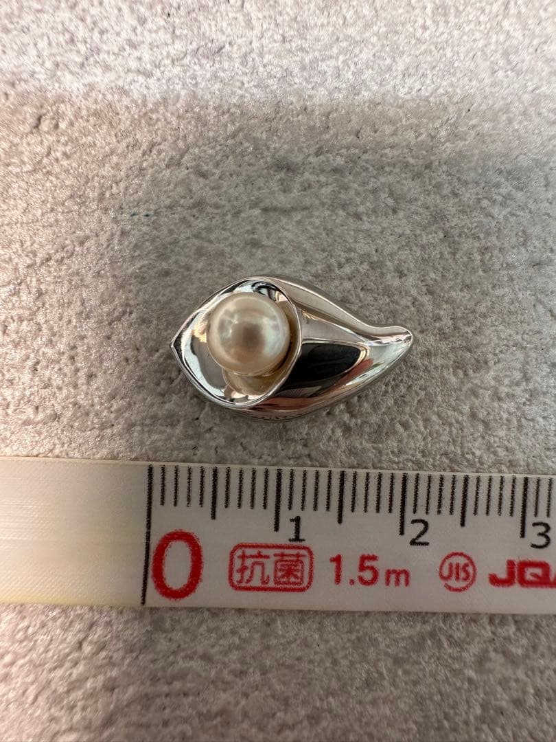 18.233 Tasaki pearl pendant top in silver with pearl decoration on customizable chain