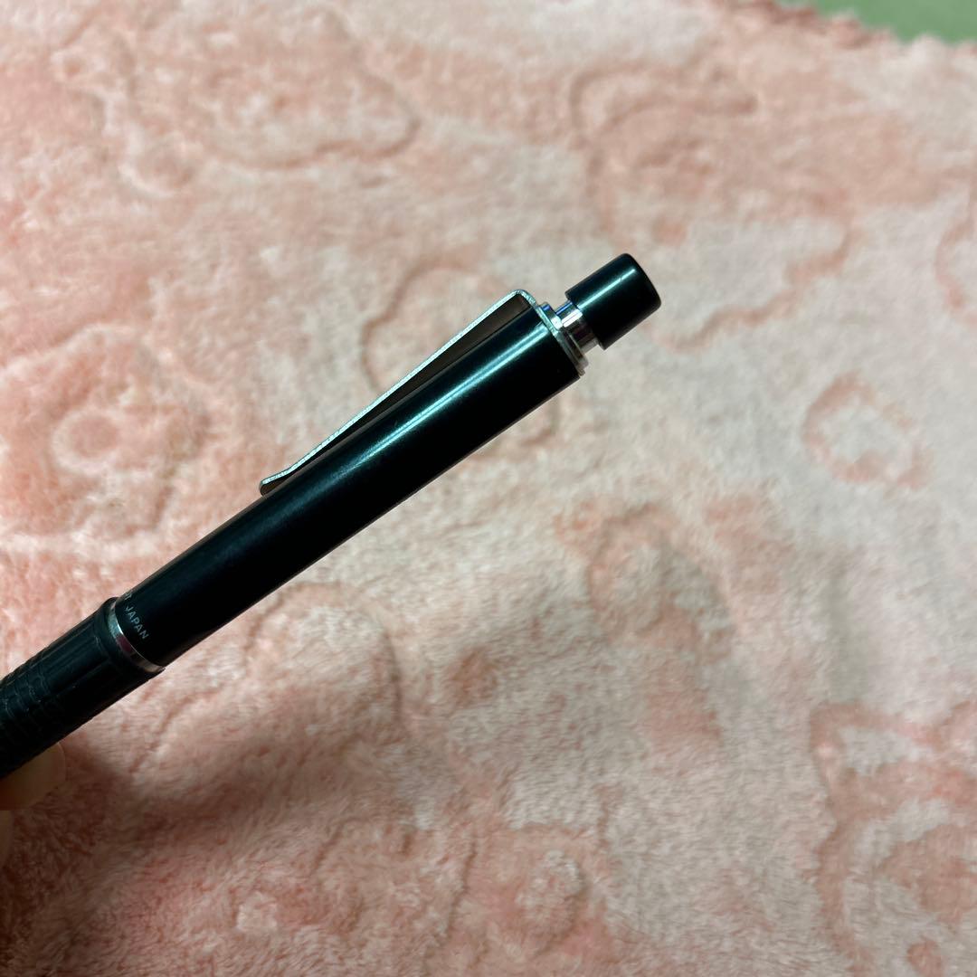 Pilot GIMNO Black pen featuring metal tip, rubber grip, and simple black plastic and metal body
