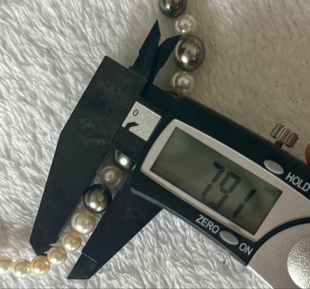 Silver necklace with 7.9-10mm Black Lip South Sea and Akoya pearls, 43.5cm length, displayed on white background
