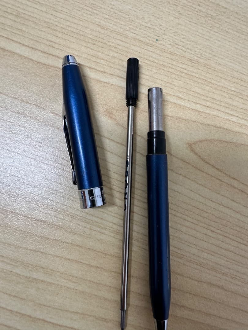 Cross ballpoint pen with sleek design in clean condition shown from the side