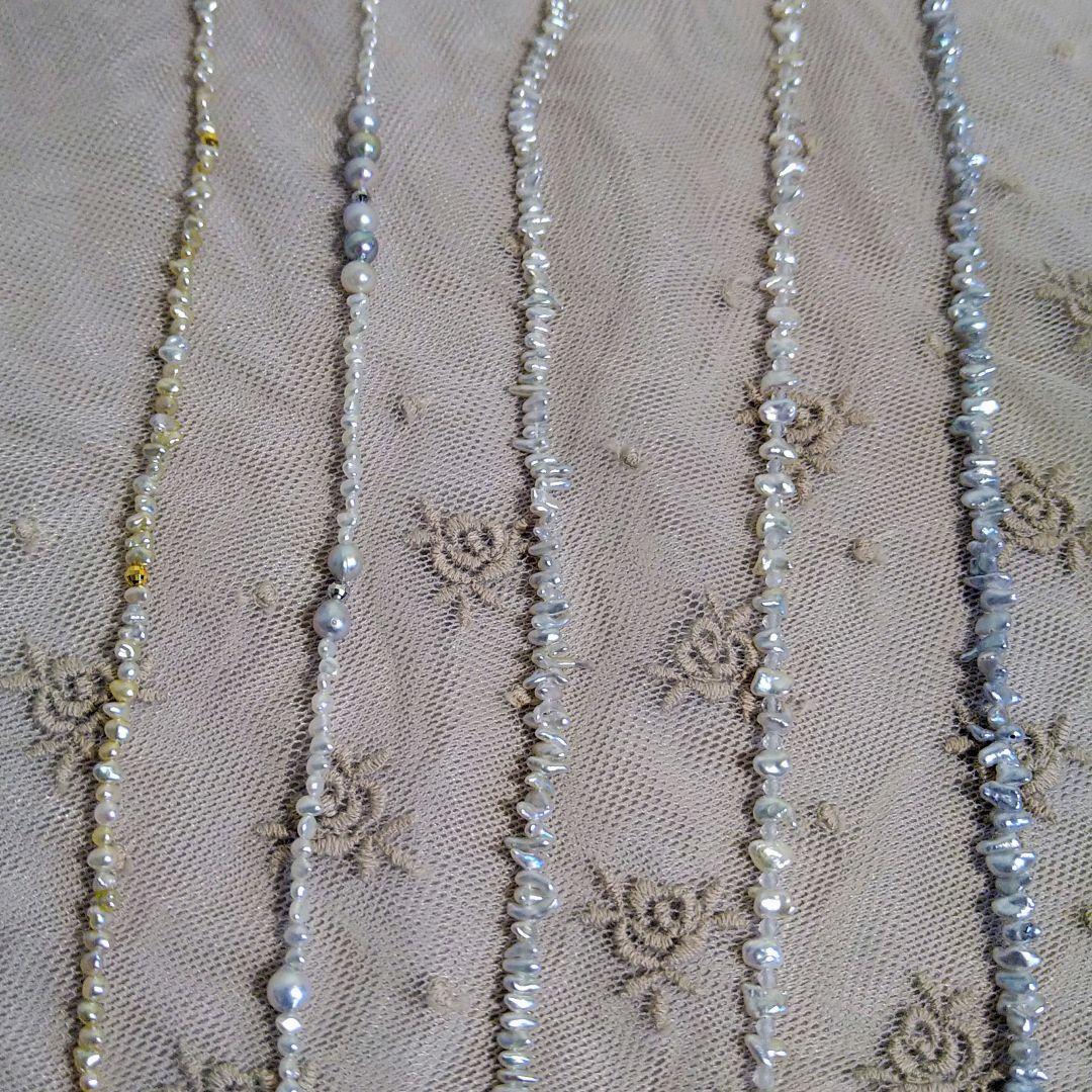 Long necklace with 2.5-3.5mm Akoya Keshi pearls and 5mm natural color Akoya baroque pearls on silver925 chain