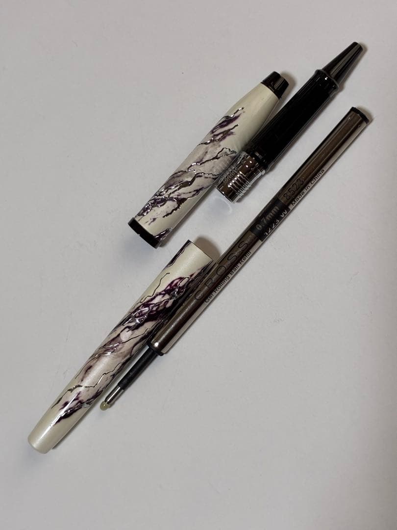 CROSS Wonderlust Everest Select Tip rollerball pen with white ivory pearl base and clean, scratch-free body