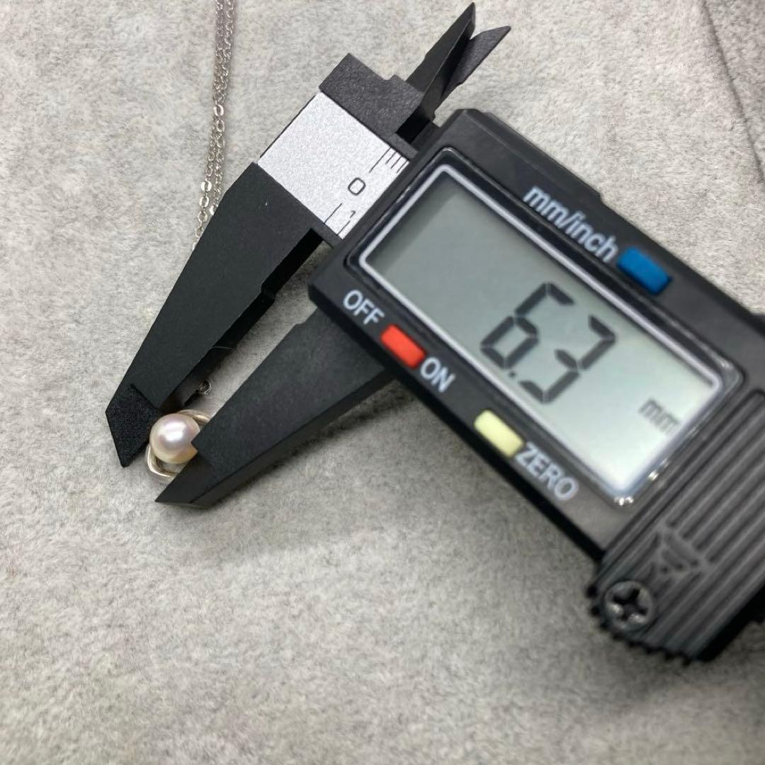 Akoya pearl necklace with 6.3mm white pearls and silver mark pendant on 41cm chain