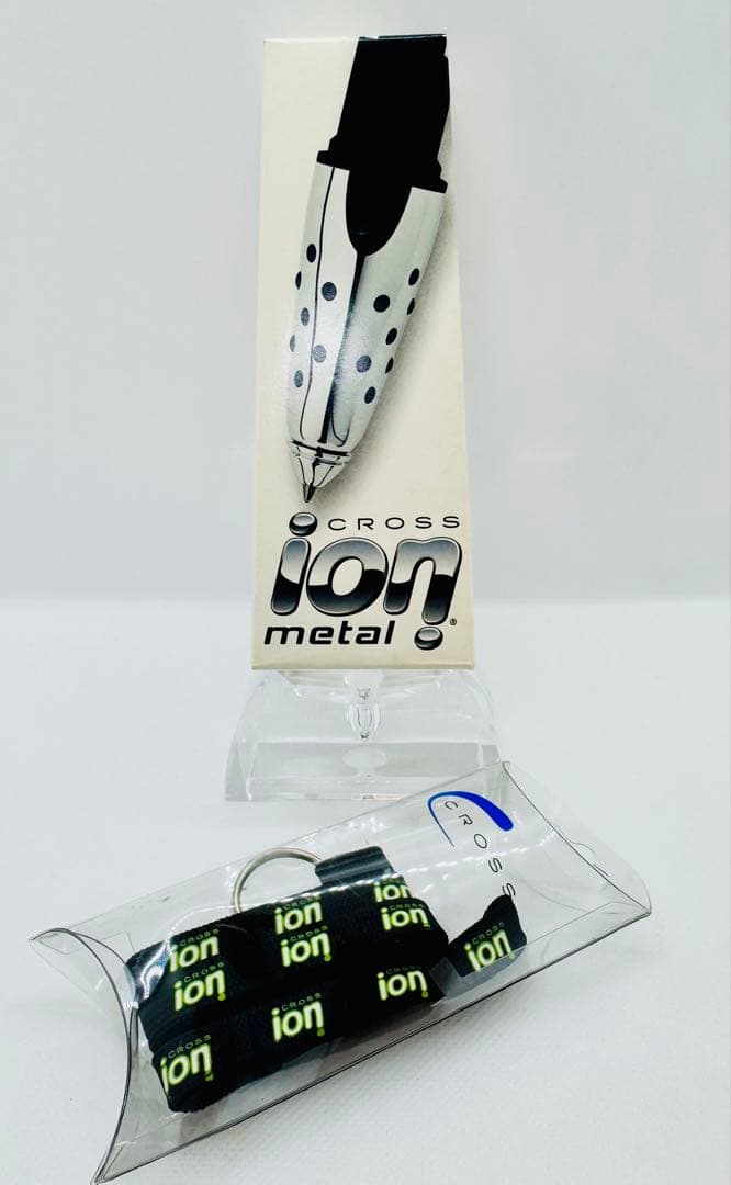 CROSS ion Kuro silver rollerball pen with glossy body, shown with original case and packaging