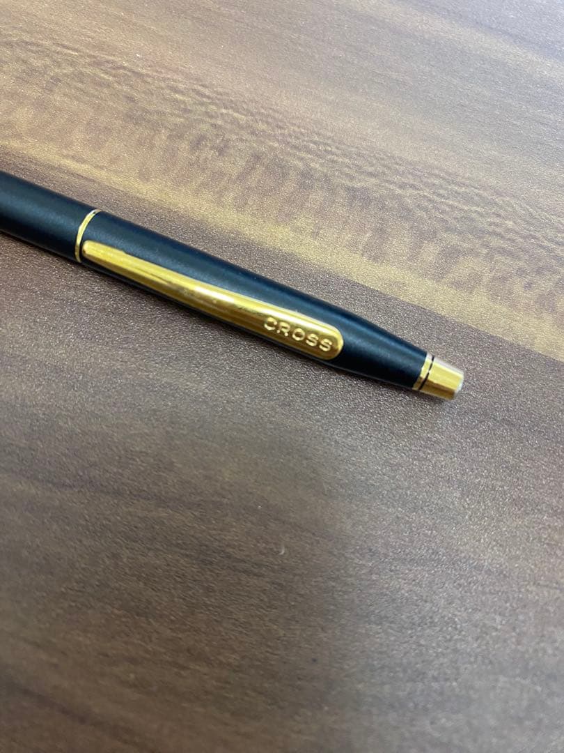 CROSS Black Metal Ballpoint Pen with two-tone metal design on a white background