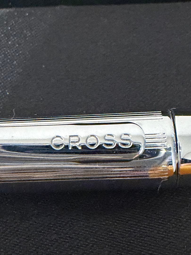 Cross 2-Color ballpoint pen showing black and red ink options with refill included