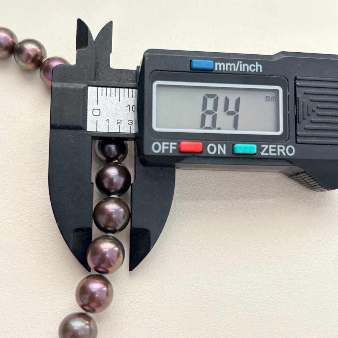 Akoya pearl necklace with 8-8.5mm peacock pearls and silver fittings measuring 45.5cm length