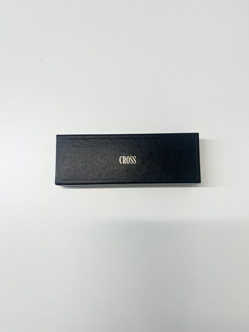 CROSS gold ballpoint pen made of 10K gold with simple design, displayed with box