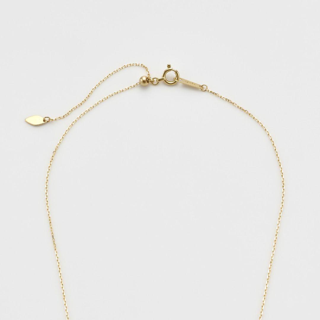 agete K18 gold necklace featuring a delicate chain with sparkling diamond pendant