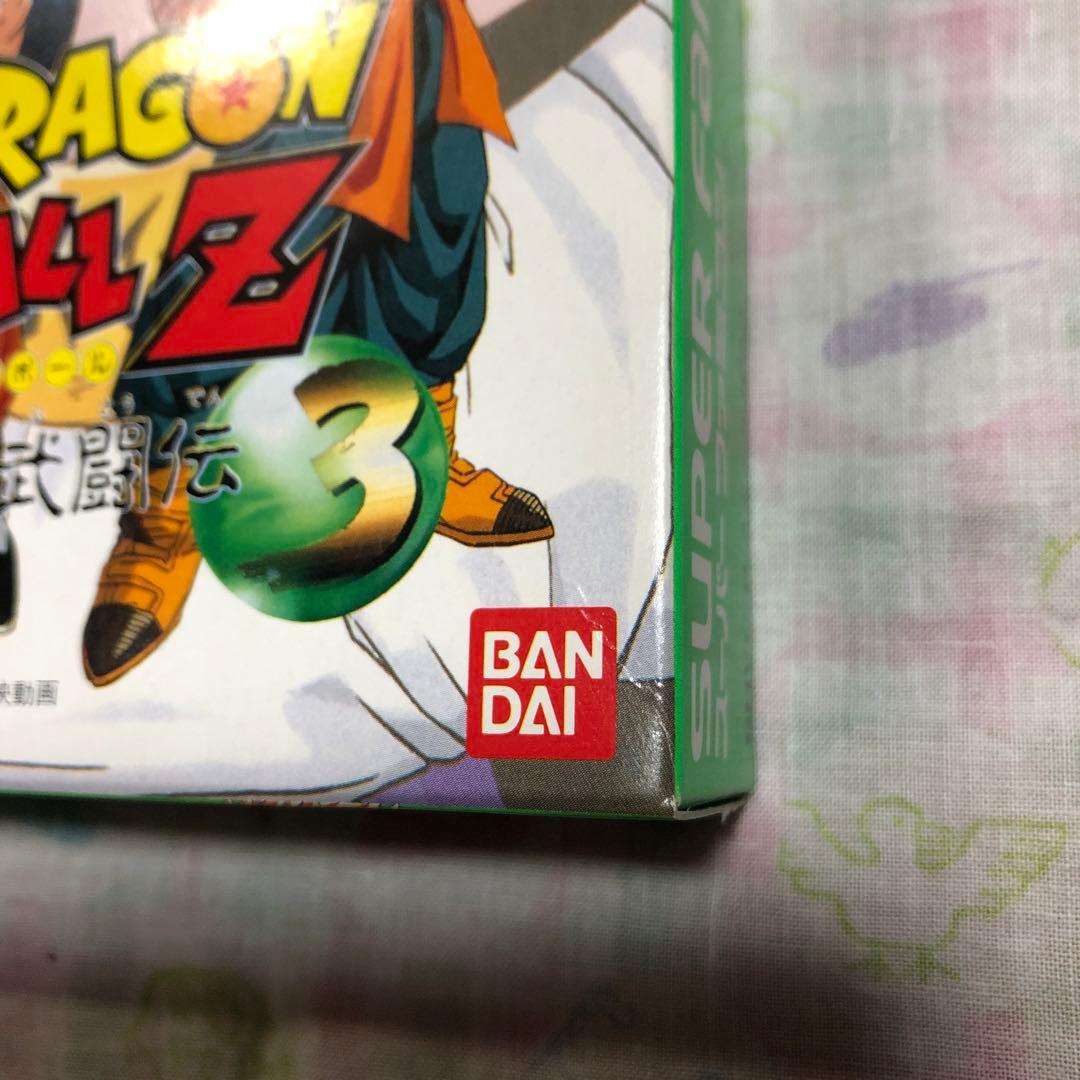 Dragon Ball Z Super Butoden 3 SNES video game cartridge and box with slight damage on bottom right corner