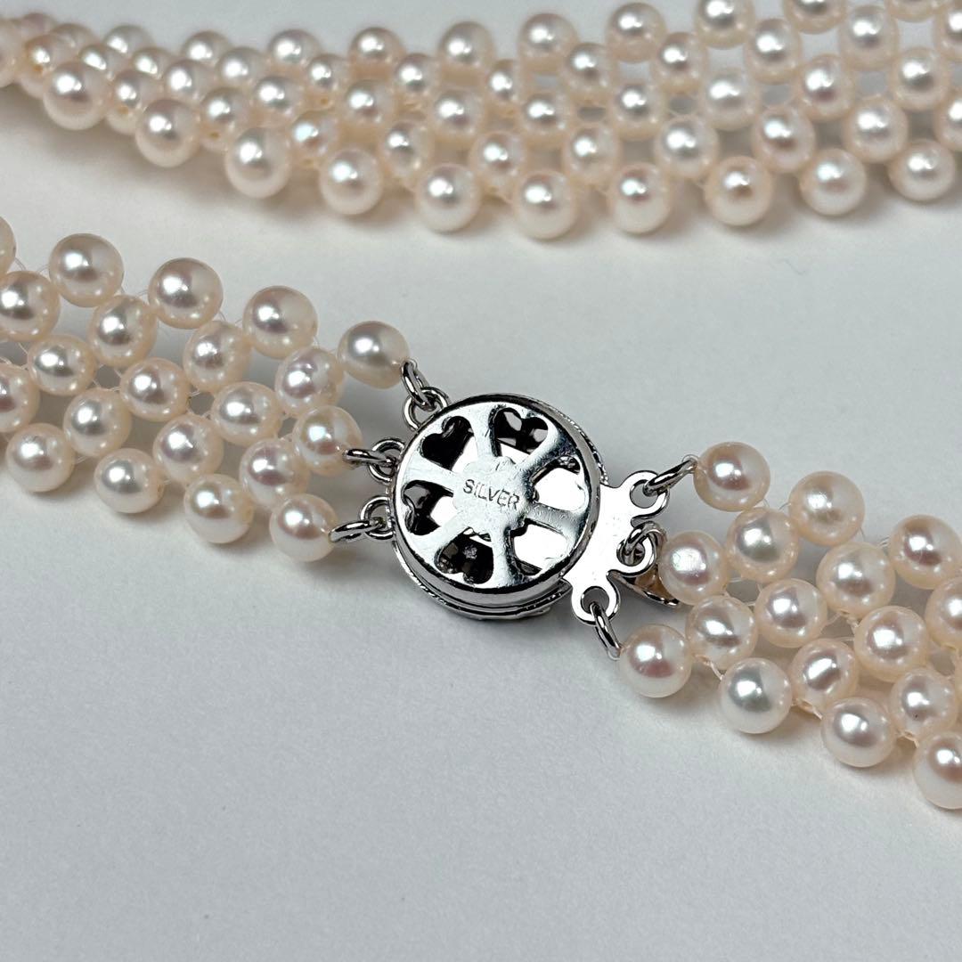 Small pearl three-row knitted necklace with 4.2mm pearls and 45cm length featuring an insert-shaped clasp