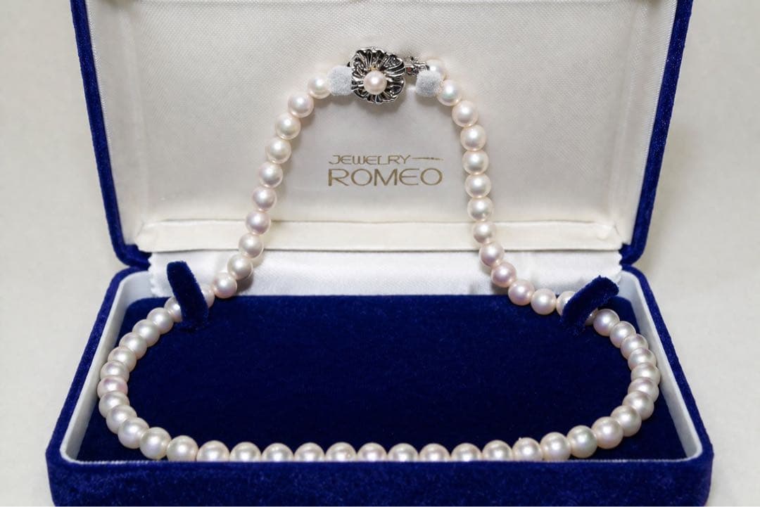 Akoya pearl necklace with 7.0-7.31mm pearls silver stamp displayed with a box