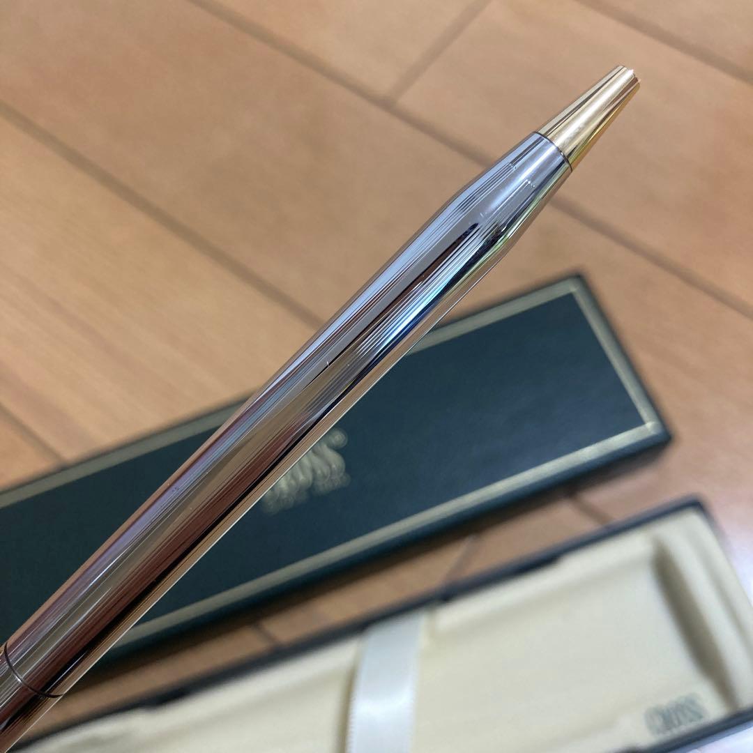 New Cross ballpoint pen with silver and gold finish, unused and stored without box