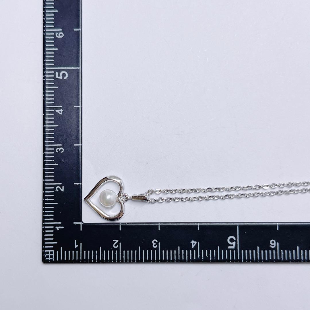 Mikimoto pearl necklace with 4.4mm pearls and silver heart pendant on a 39cm chain
