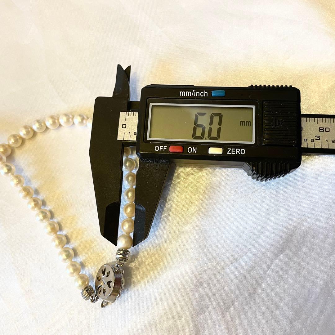Akoya pearl necklace with three strands and silver clasp, 132cm length