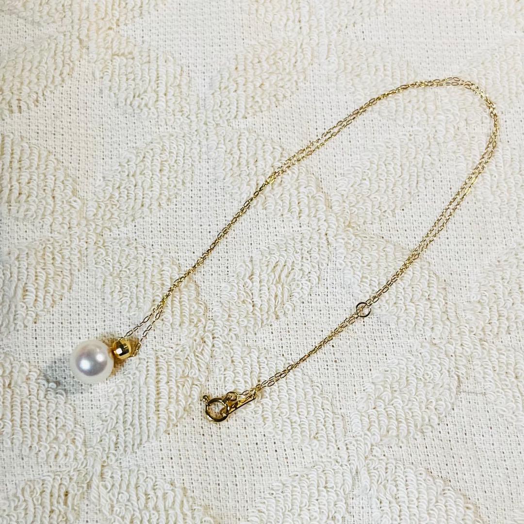 K18 yellow gold necklace with 8mm Akoya pearls approximately 40cm long adjustable length
